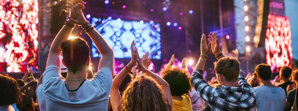 Concert with a group of young adults cheering