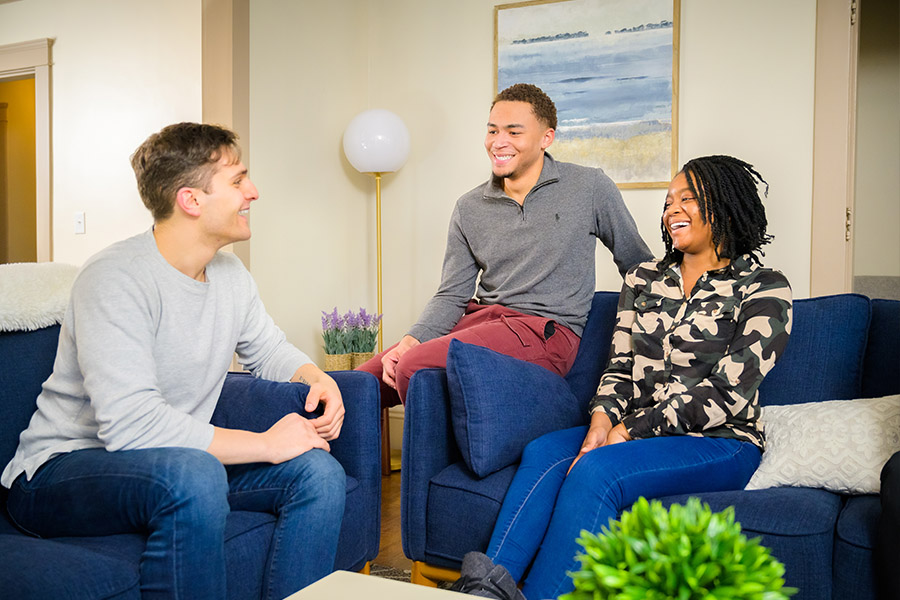 group of patients chatting in common area after under going detox for stimulants 